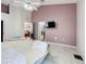 Spacious bedroom with a ceiling fan and walk-in closet at 2508 Balmoral Dr, Kissimmee, FL 34744