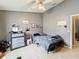 Comfortable bedroom with double bed, dresser, and closet at 2508 Balmoral Dr, Kissimmee, FL 34744