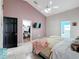 Main bedroom with large bed and walk-in closet at 2508 Balmoral Dr, Kissimmee, FL 34744