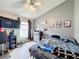 Bedroom with a double bed, dresser, and large window at 2508 Balmoral Dr, Kissimmee, FL 34744
