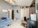Bedroom featuring a bed, dresser, and ample closet space at 2508 Balmoral Dr, Kissimmee, FL 34744