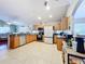 Open kitchen with granite countertops, ample cabinetry, and stainless steel appliances at 2508 Balmoral Dr, Kissimmee, FL 34744