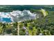 Aerial view of home, pool, and lakefront lot at 2530 E New York Ave, Deland, FL 32724