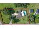 Aerial view of a home with pool and large lot at 2530 E New York Ave, Deland, FL 32724