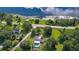Aerial view of property near lake with pool at 2530 E New York Ave, Deland, FL 32724