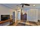 Charming bedroom with hardwood floors and ample closet space at 2530 E New York Ave, Deland, FL 32724