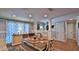 Charming dining room with hardwood floors and stylish geometric curtains at 2530 E New York Ave, Deland, FL 32724