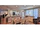 Open concept dining room with view into the kitchen at 2530 E New York Ave, Deland, FL 32724