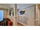 Entryway with wainscoting and decorative wall art at 2530 E New York Ave, Deland, FL 32724