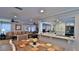 Open concept kitchen with granite counters and stainless steel appliances at 2530 E New York Ave, Deland, FL 32724