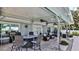 Spacious patio with seating area and ceiling fans at 2530 E New York Ave, Deland, FL 32724