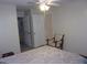 Bedroom with double doors leading to the bathroom at 2770 Coastal Bay Dr # 3-103, Orange City, FL 32763