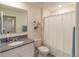 Clean bathroom with granite vanity, bathtub, and shower at 3033 Meleto Blvd, New Smyrna Beach, FL 32168