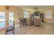 Open concept living room with comfortable seating and built-in shelving at 3033 Meleto Blvd, New Smyrna Beach, FL 32168