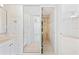 Bathroom with shower, double vanity and mirrored wall at 3047 S Atlantic Ave # 1906, Daytona Beach, FL 32118