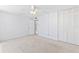 Bright bedroom with ceiling fan and spacious closet at 3047 S Atlantic Ave # 1906, Daytona Beach, FL 32118