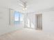 Bright bedroom with water views and built-in shelving at 3047 S Atlantic Ave # T060, Daytona Beach, FL 32118