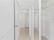 Hallway with access to bedroom and closet at 3047 S Atlantic Ave # 1906, Daytona Beach, FL 32118