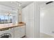 White kitchen with appliances and ample cabinet space at 3047 S Atlantic Ave # 1906, Daytona Beach, FL 32118