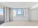Living room with ocean view and floor-to-ceiling windows at 3047 S Atlantic Ave # 1906, Daytona Beach, FL 32118