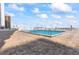 Relaxing community pool area with ocean views and patio at 3047 S Atlantic Ave # T060, Daytona Beach, FL 32118