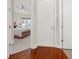 View of bedroom from hallway; features a king bed and large windows at 310 La Creek Ct, Debary, FL 32713