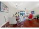 Elegant dining room with hardwood floors and modern table set at 310 La Creek Ct, Debary, FL 32713