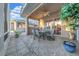 Relaxing screened patio with outdoor furniture and lake view at 310 La Creek Ct, Debary, FL 32713