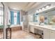 Double vanity, large soaking tub, and walk-in shower at 34 Black Creek Way, Ormond Beach, FL 32174