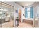 Bathroom with double vanity, garden tub, and walk-in shower at 34 Black Creek Way, Ormond Beach, FL 32174