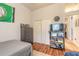 Bedroom with twin bed, dresser, and access to hallway at 34 Black Creek Way, Ormond Beach, FL 32174