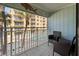 Relaxing balcony overlooking the pool and partial ocean view at 3509 S Atlantic Ave # 208, New Smyrna Beach, FL 32169
