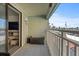 Private balcony with ocean view and seating at 3509 S Atlantic Ave # 208, New Smyrna Beach, FL 32169