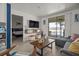 Living room with ocean view and comfortable seating at 3509 S Atlantic Ave # 208, New Smyrna Beach, FL 32169