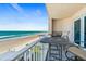 Balcony with seating offers stunning views of the ocean and sandy beach below at 3737 S Atlantic Ave # 502, Daytona Beach, FL 32118