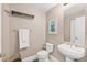 Half bath including modern toilet and sink at 3737 S Atlantic Ave # 502, Daytona Beach, FL 32118