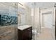 Bathroom with granite vanity, walk-in shower, and tile flooring at 3737 S Atlantic Ave # 502, Daytona Beach, FL 32118