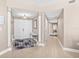 Inviting foyer with tile flooring, neutral walls, decor, and a double door entrance at 3737 S Atlantic Ave # 502, Daytona Beach, FL 32118