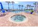 Relaxing hot tub area next to the pool and patio at 3737 S Atlantic Ave # 502, Daytona Beach, FL 32118