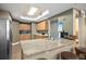 Community kitchen with granite countertop at 3737 S Atlantic Ave # 502, Daytona Beach, FL 32118