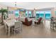 Spacious living room with ocean views, tile floors, and comfortable seating at 3737 S Atlantic Ave # 502, Daytona Beach, FL 32118