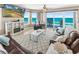 Relaxing living room with ocean views, comfortable seating, and a fireplace at 3737 S Atlantic Ave # 502, Daytona Beach, FL 32118