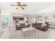 Spacious living room with leather sofas and an open layout connecting to the kitchen at 3737 S Atlantic Ave # 502, Daytona Beach, FL 32118