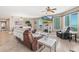 Cozy living room with ocean views, comfortable seating, and plenty of natural light at 3737 S Atlantic Ave # 502, Daytona Beach, FL 32118