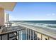 Balcony with table and chairs overlooking the ocean at 3737 S Atlantic Ave # 502, Daytona Beach, FL 32118