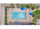 Overhead view of pool, hot tub, and patio furniture at 3737 S Atlantic Ave # 502, Daytona Beach, FL 32118
