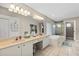 Bathroom features a large vanity with double sinks, a soaking tub and shower at 39 Ormond Green Blvd, Ormond Beach, FL 32174