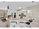Bright kitchen featuring a breakfast bar with seating, modern appliances, and an adjacent dining area at 39 Ormond Green Blvd, Ormond Beach, FL 32174