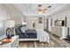 Spacious bedroom featuring a plush bed, ceiling fan, and ample natural light at 39 Ormond Green Blvd, Ormond Beach, FL 32174