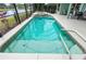 Inviting pool with clear blue water and spa, perfect for relaxation and enjoying outdoor living at 39 Ormond Green Blvd, Ormond Beach, FL 32174